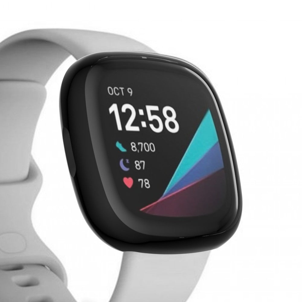 Primo piano di uno smartwatch con cinturino grigio chiaro. Il display mostra le 12:58.