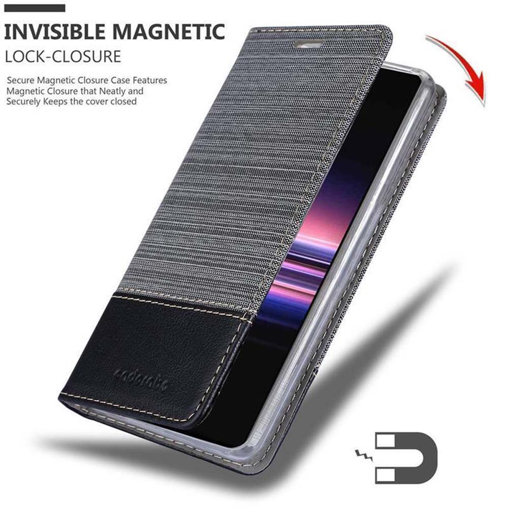 Custodia grigia in tessuto con accento in pelle nera per smartphone. Chiusura magnetica.