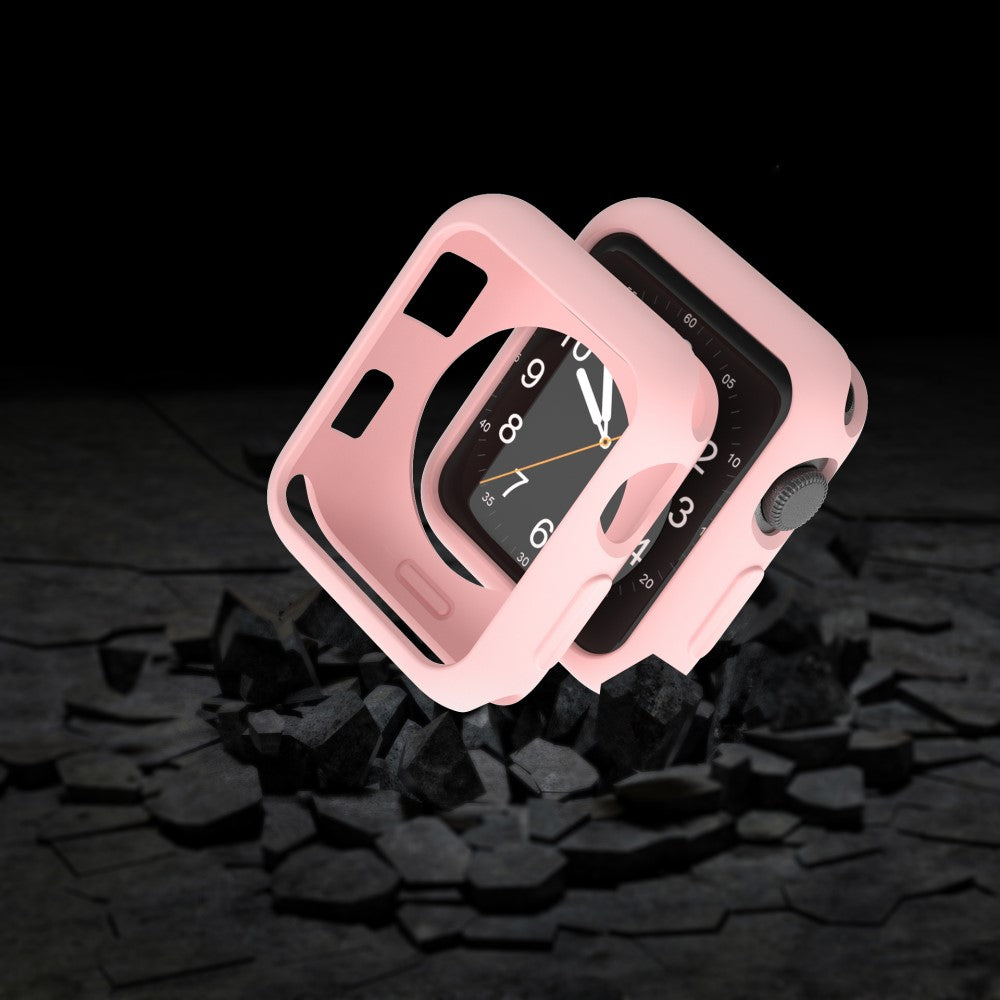Due custodie protettive rosa per smartwatch poggiano su pietra rotta.