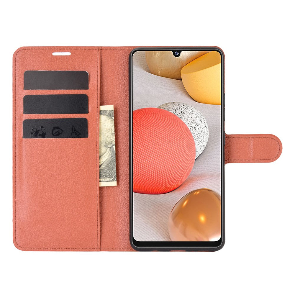 Un portafoglio per telefono apribile arancione con slot per carte e una banconota.