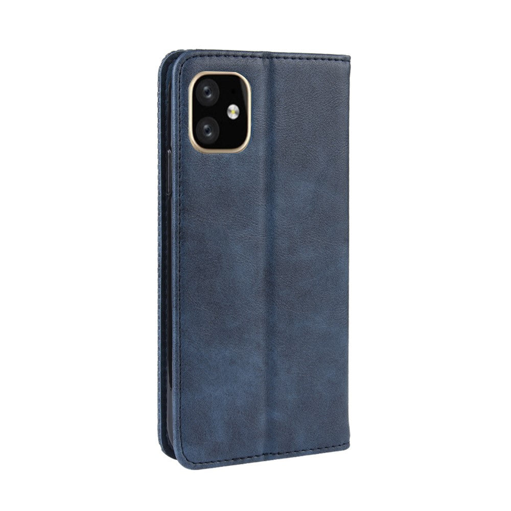 Custodia blu scuro aperta per telefono con modulo fotocamera.