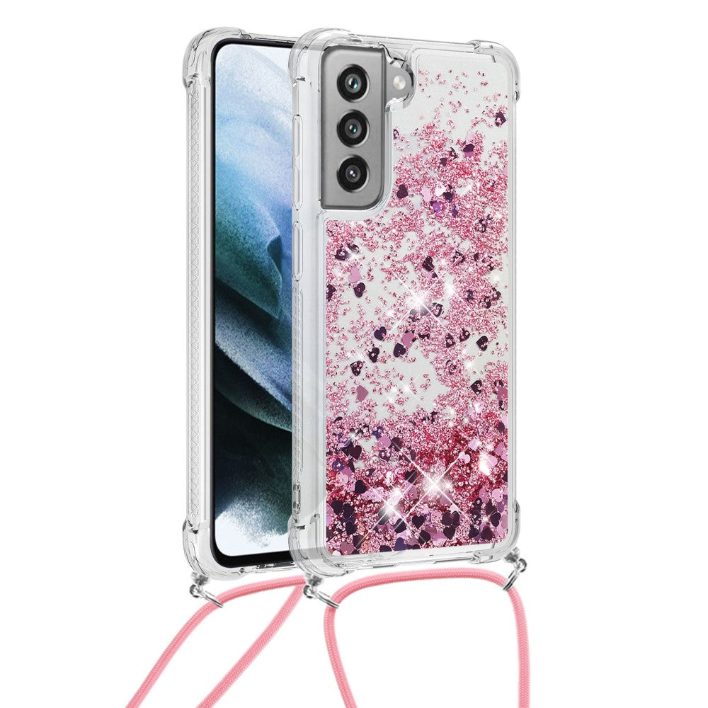 Custodia trasparente per telefono con cuori glitter rosa e tracolla.