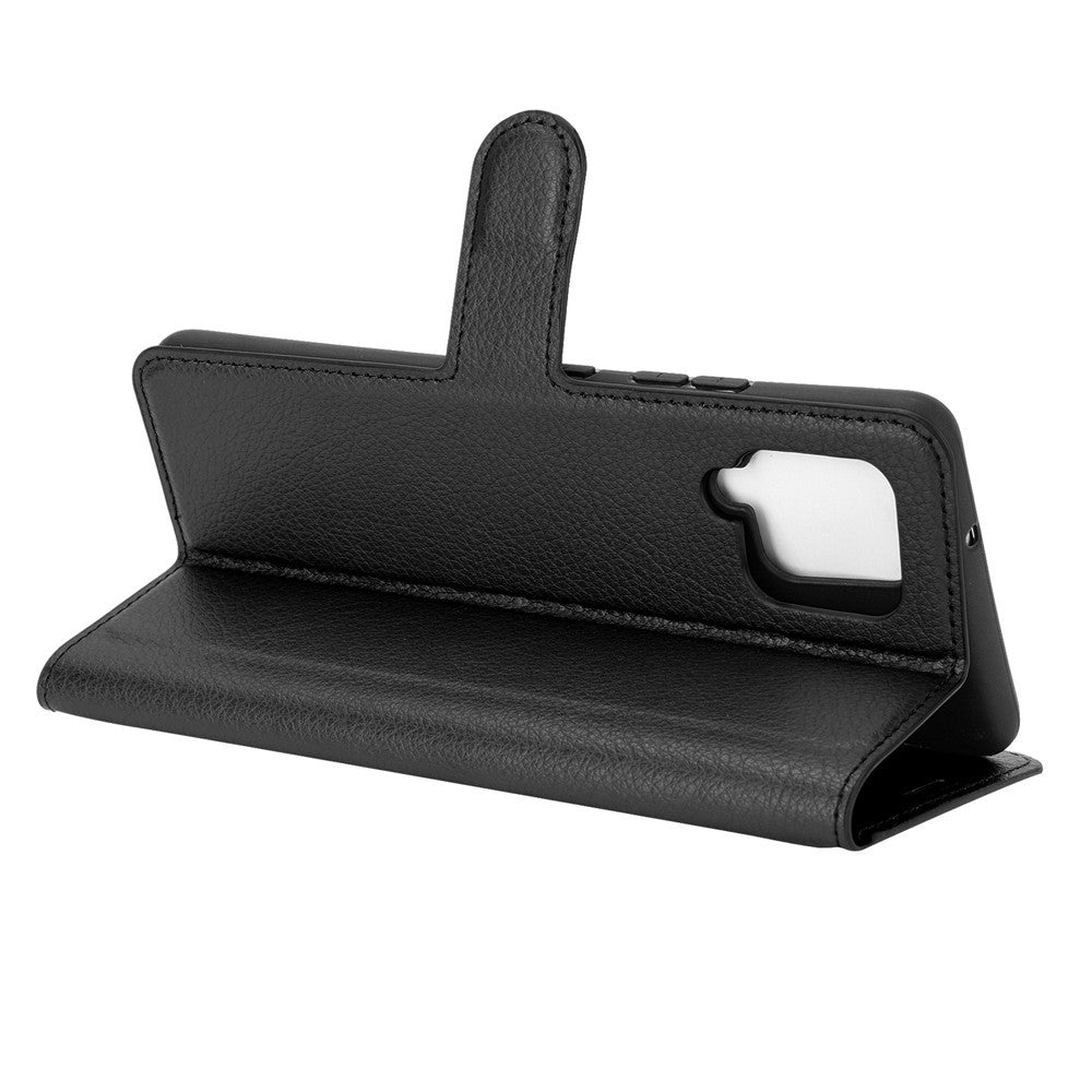Custodia a libro in pelle nera per smartphone, su sfondo bianco.