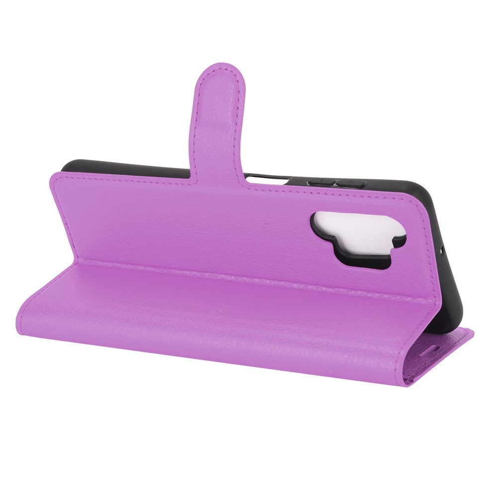 Custodia viola per telefono aperta, con ritaglio fotocamera e pulsanti.