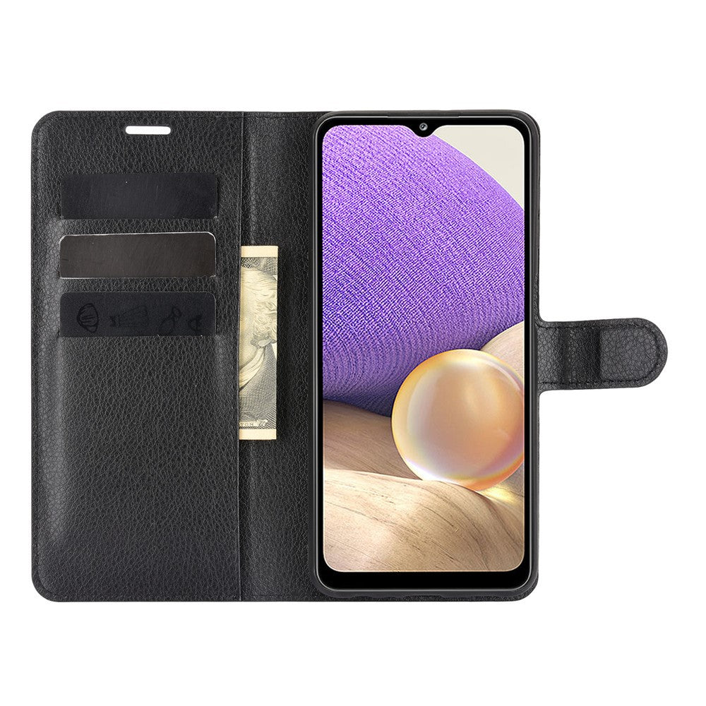 Custodia a libro in pelle nera per smartphone con slot per carte e banconota.