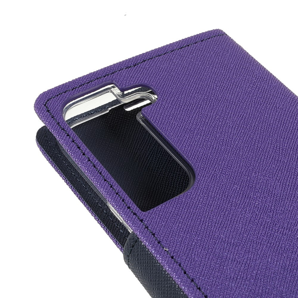 Custodia viola per telefono con finiture argentate e interno nero.