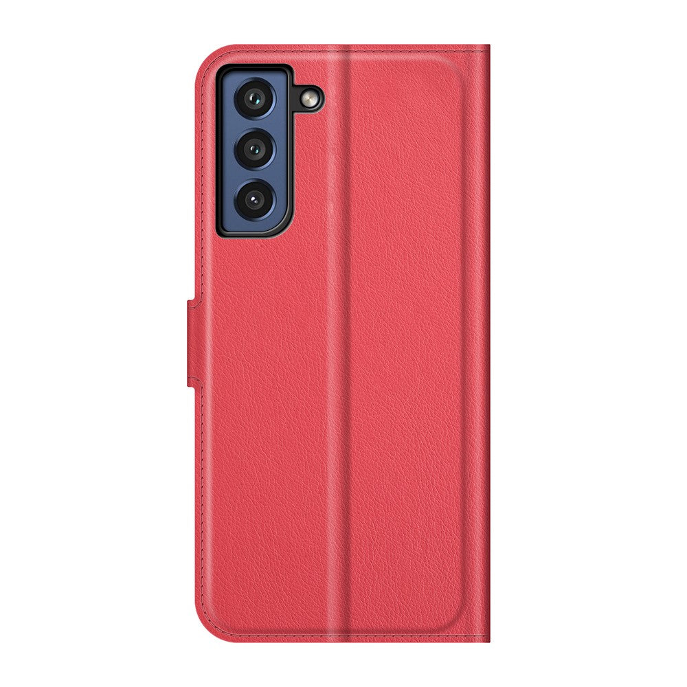 Custodia rossa per telefono con tre obiettivi della fotocamera a sinistra.