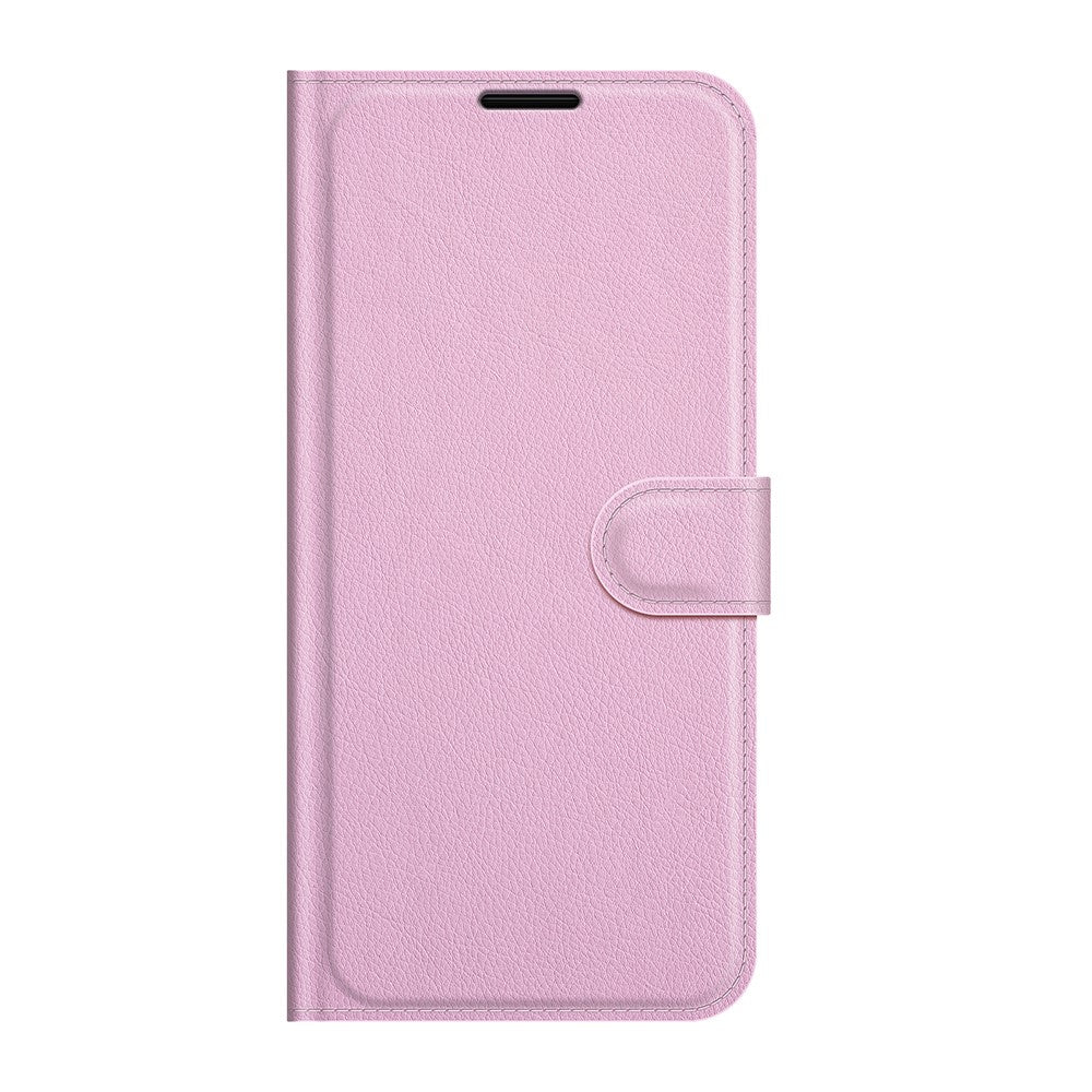Una custodia per telefono chiusa, piatta, rosa, in similpelle con chiusura.