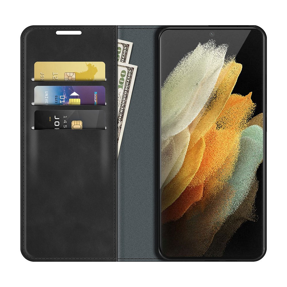 Custodia nera con slot per carte e banconote, accanto allo schermo di uno smartphone.
