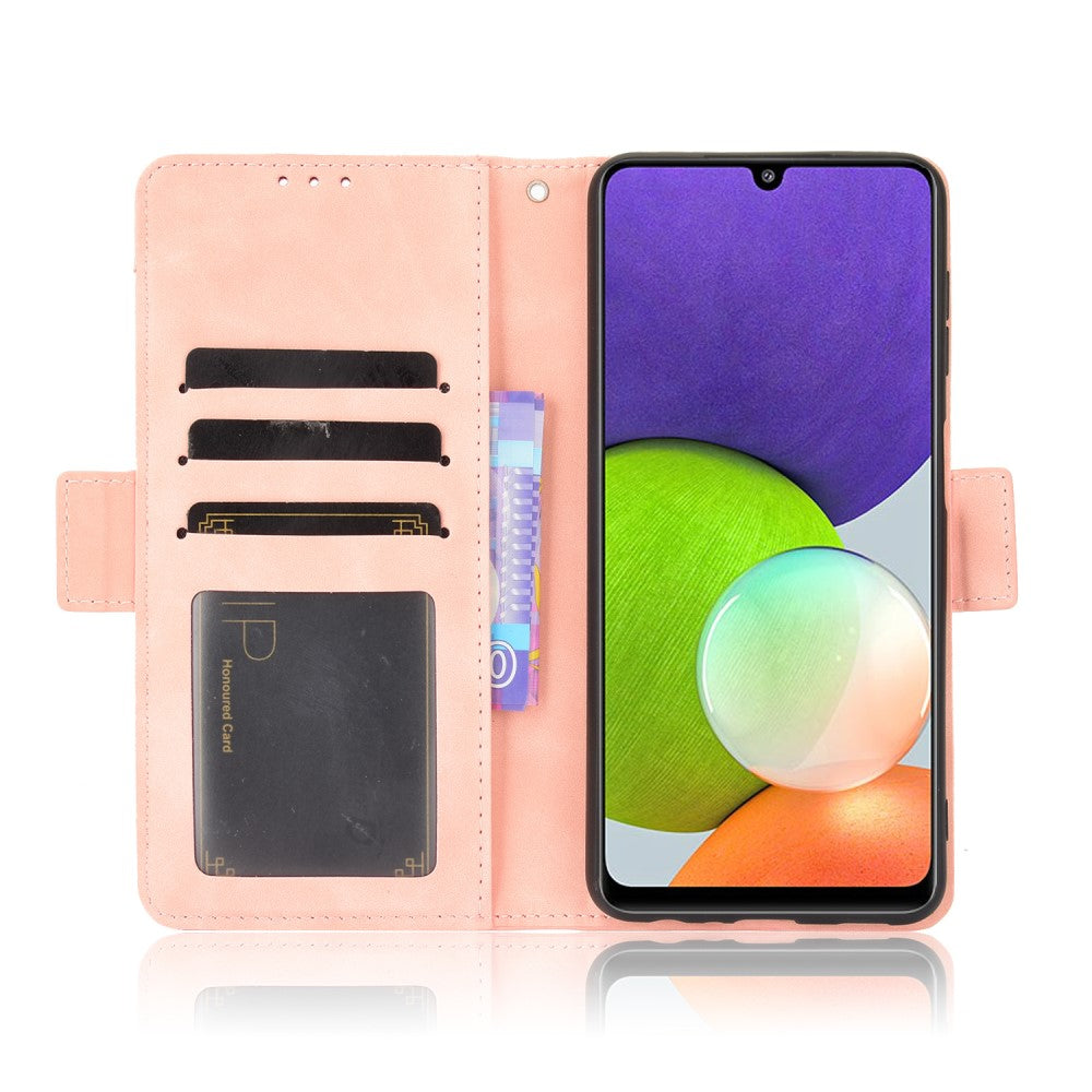 Una custodia rosa per telefono con slot per carte e uno smartphone.
