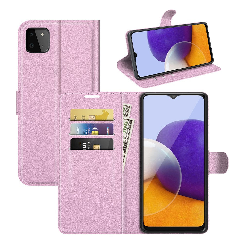 Un porta telefono rosa con slot per carte e contanti.
