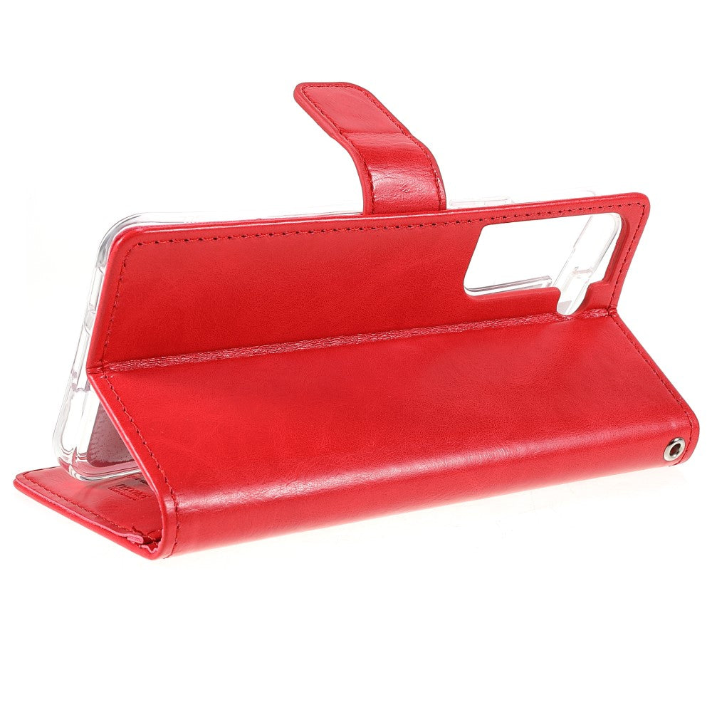 Custodia rossa in pelle per smartphone, aperta con inserto trasparente.
