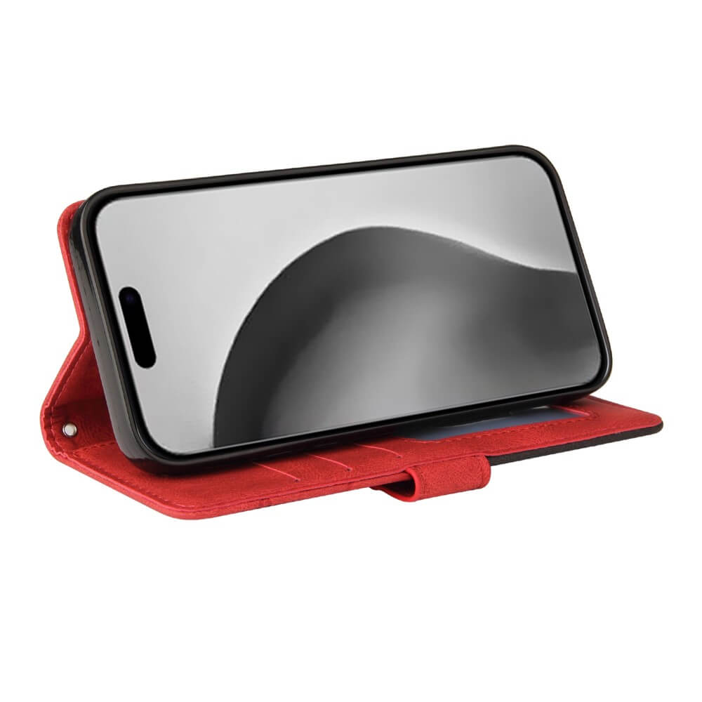 Custodia a libro rossa con smartphone appoggiato sopra.