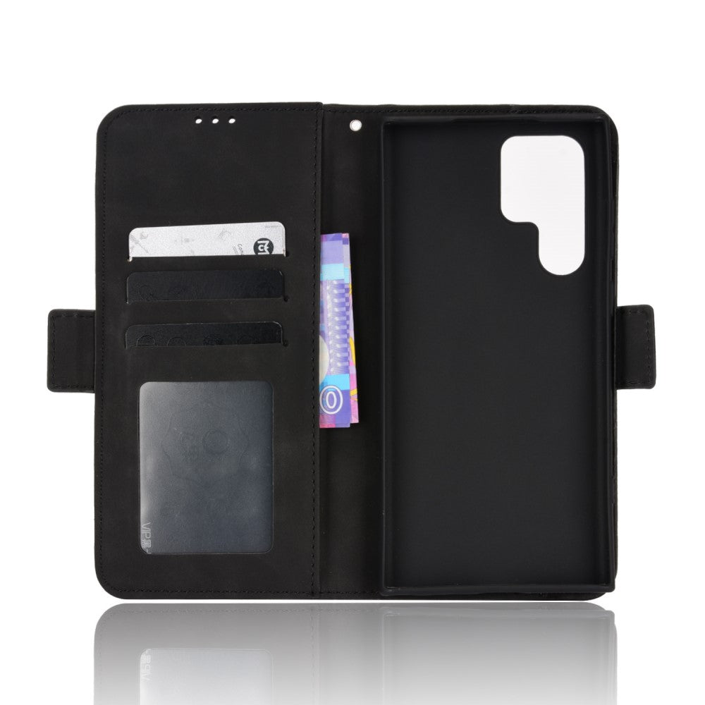 Custodia a libro nera per telefono con slot per carte e ritaglio fotocamera.