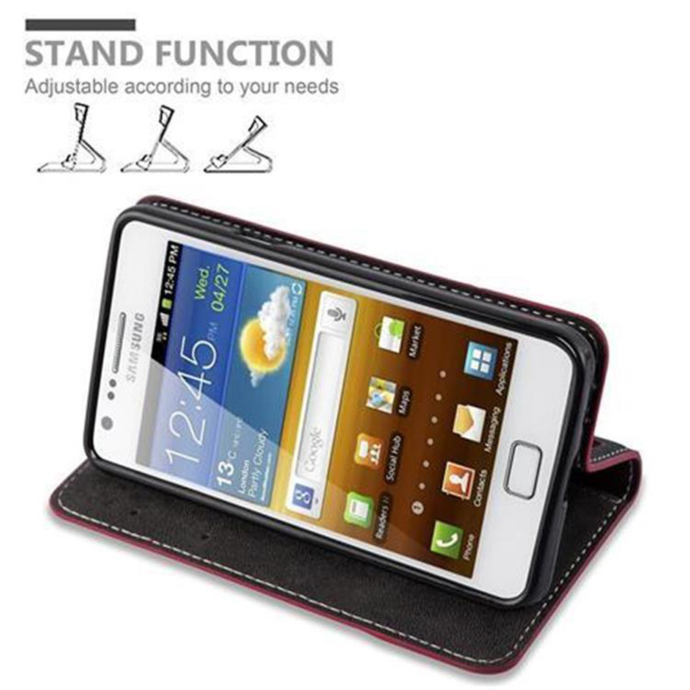Ein Samsung-Smartphone in einer schwarzen Hülle mit rotem Rand, das aufrecht steht.