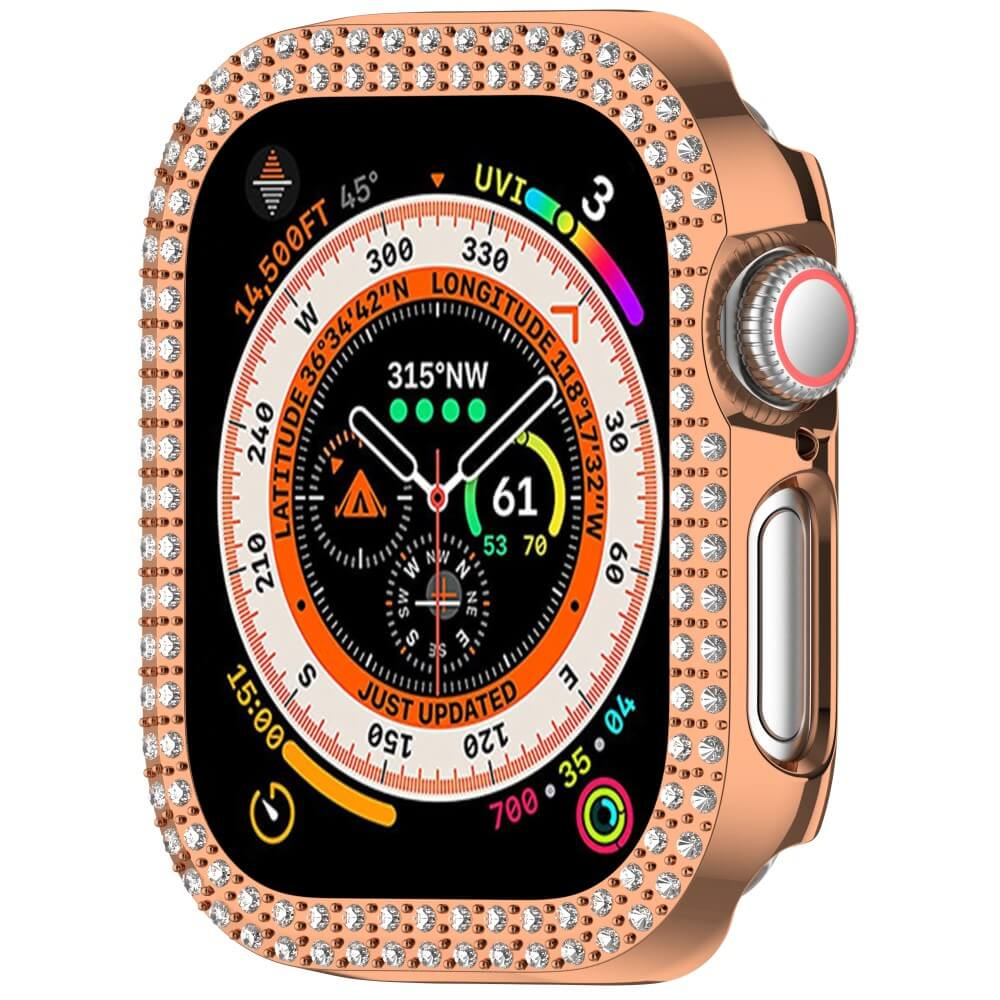 Montre connectée or rose ornée de strass, affiche l'altitude, la longitude et l'heure.
