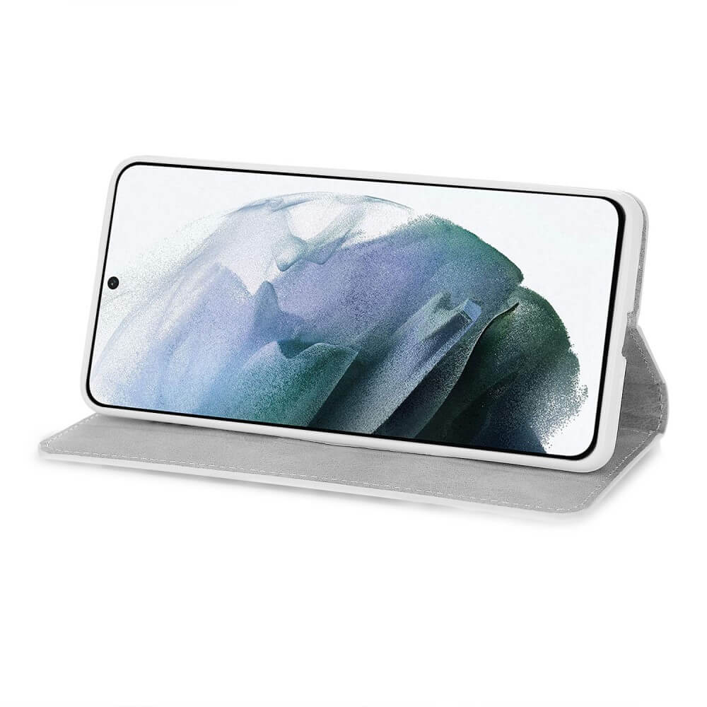 Ein weißes Smartphone in einer grauen Hülle mit abstraktem Hintergrund.