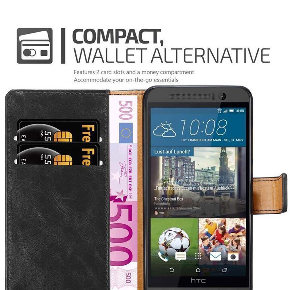 Portafoglio nero con smartphone, carte e banconota.