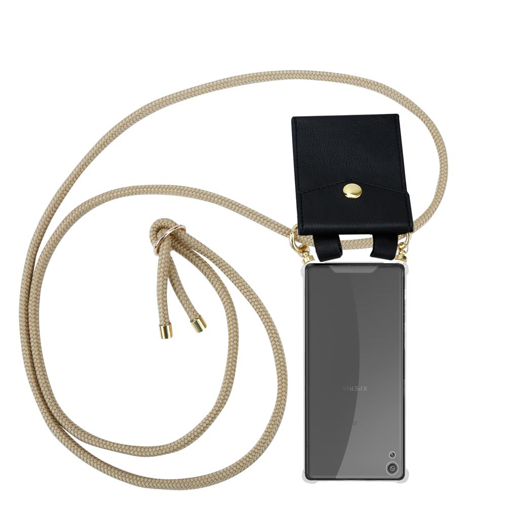 Schwarze Handytasche mit Kordel und einem Smartphone darunter.