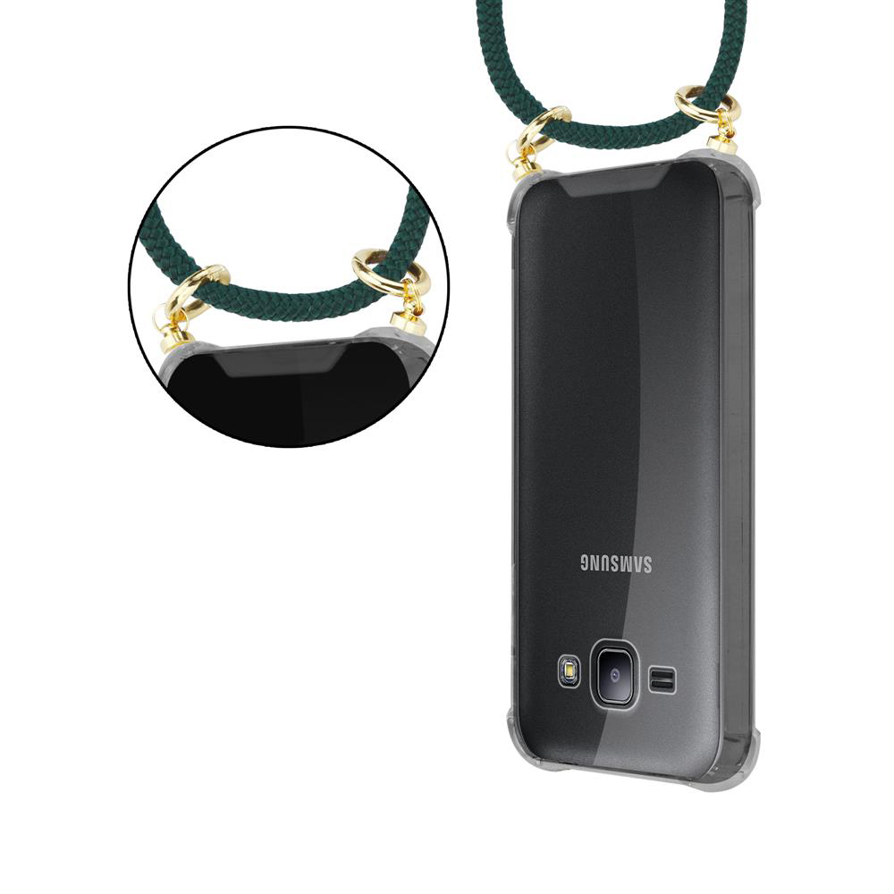 Uno smartphone Samsung nero in una custodia trasparente con cinturino verde.