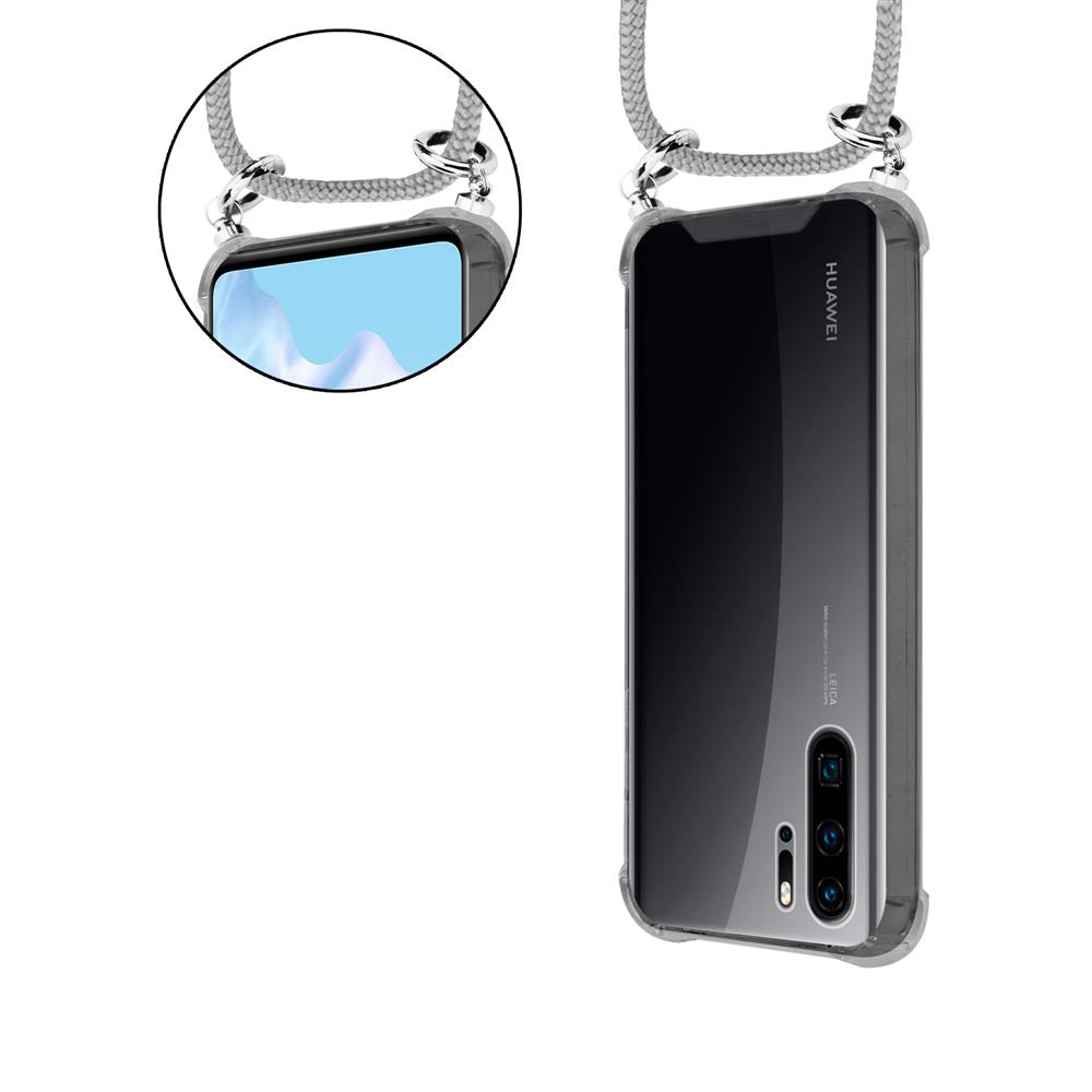 Ein Handy mit transparentem Case und Band, Nahaufnahme