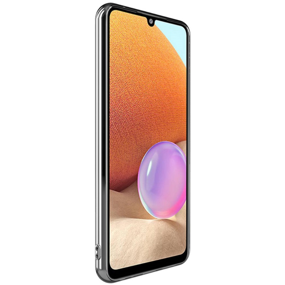Uno smartphone con cornice argentata, che mostra uno sfondo testurizzato arancione.