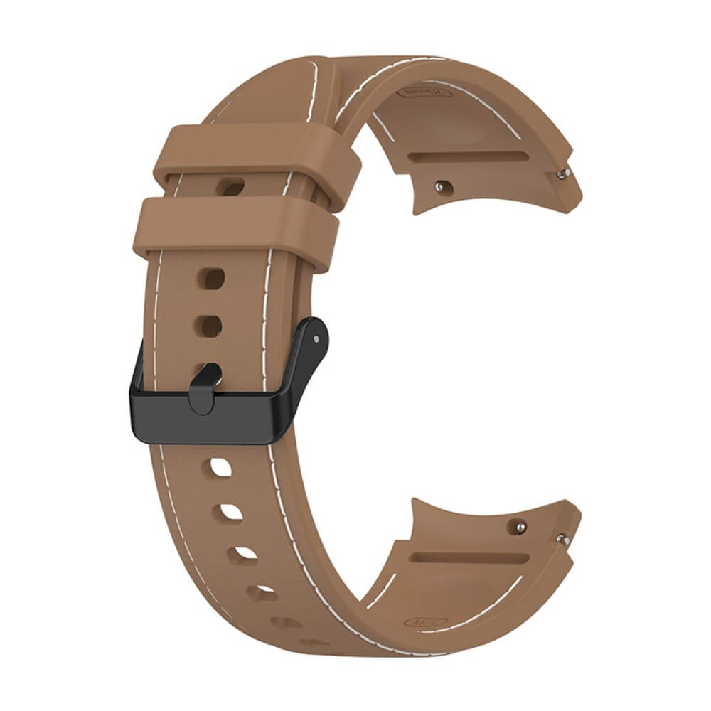 Un bracelet de montre marron avec surpiqûres blanches et boucle noire.