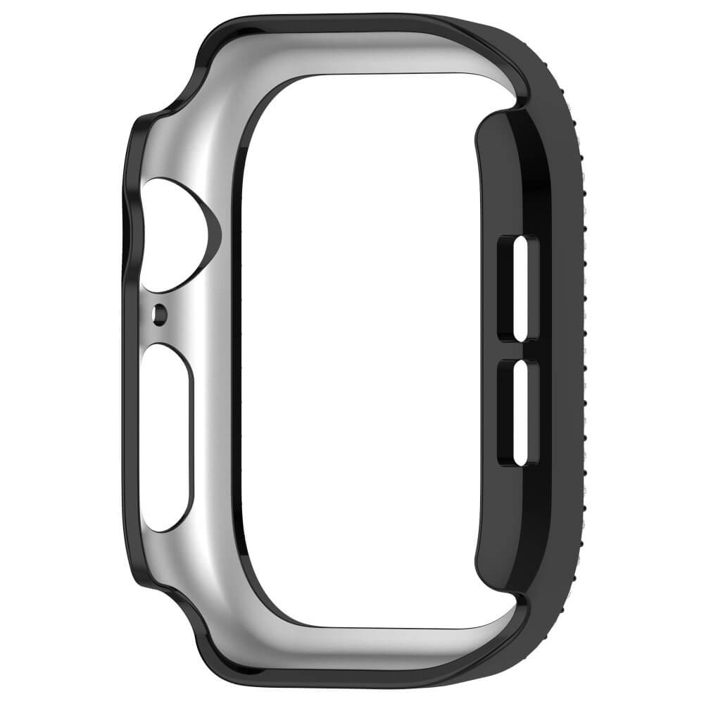 Coque noire pour montre avec bord argenté et découpes.