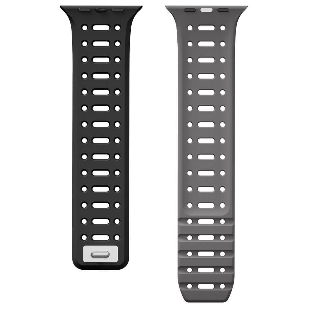 Deux bracelets de montre : un noir, un gris, avec de nombreux trous.