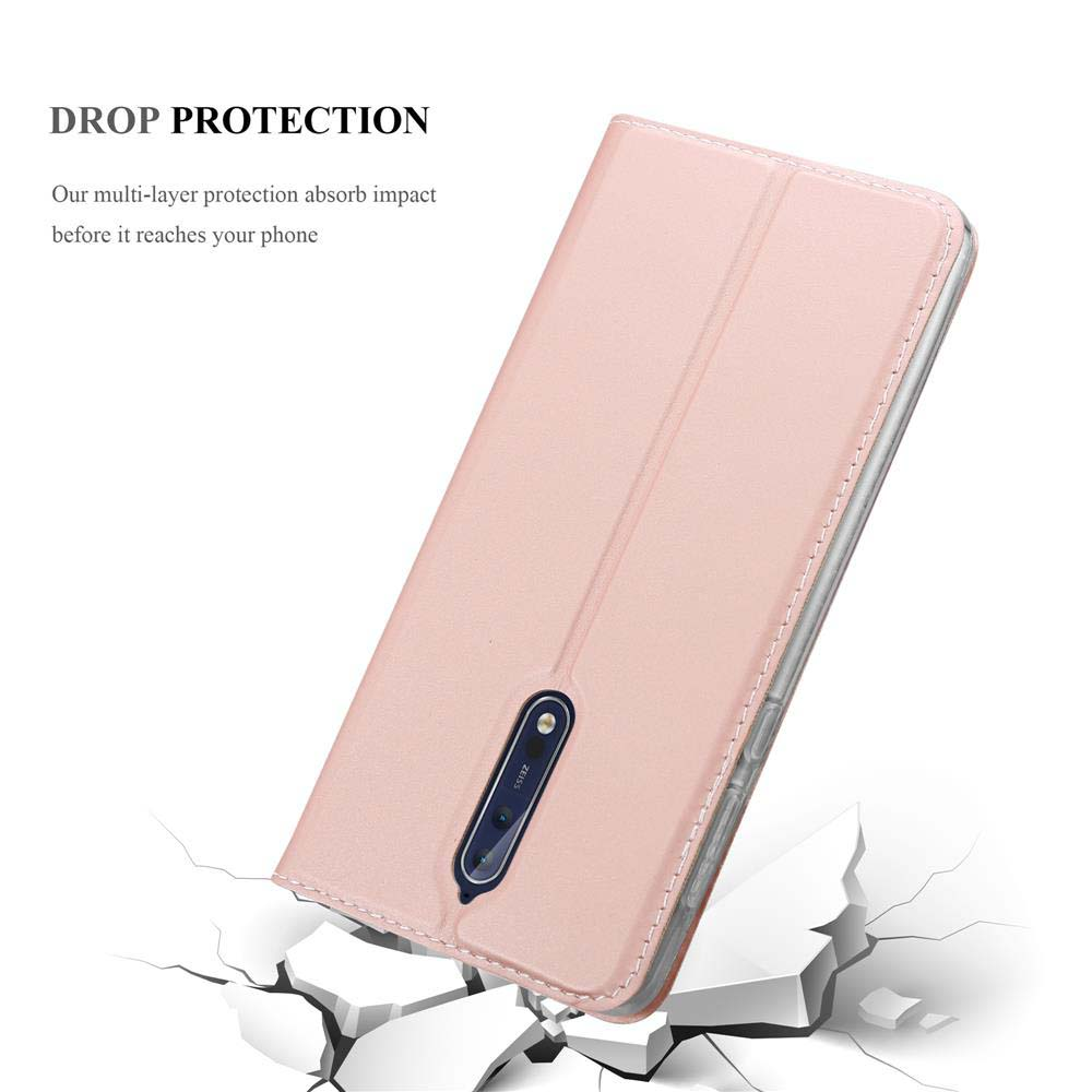 Una cover rosa per telefono protegge dalle cadute su terreno rotto.