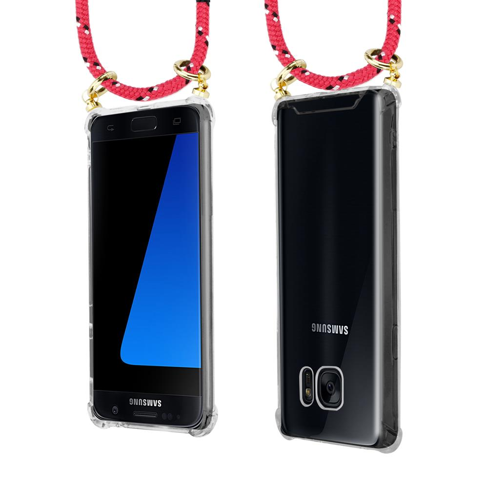 Uno smartphone in custodia trasparente con cordino rosso e anelli dorati.