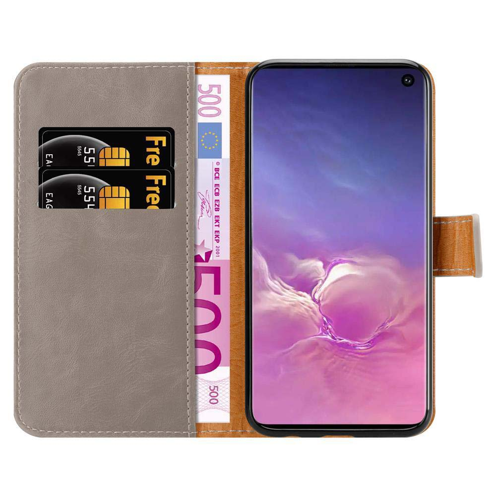 Portafoglio grigio con telefono, carte e banconote da 500 euro.