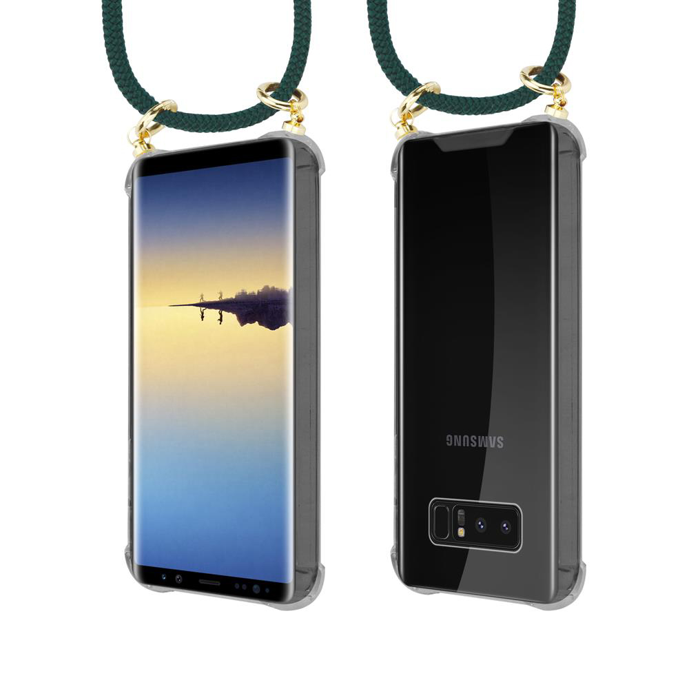 Uno smartphone in una custodia trasparente con un cordino verde.