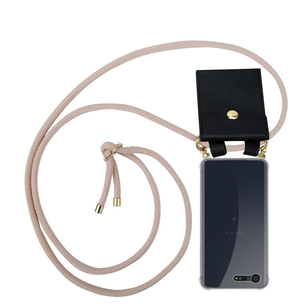 Una funda negra para teléfono con correa y un teléfono transparente.