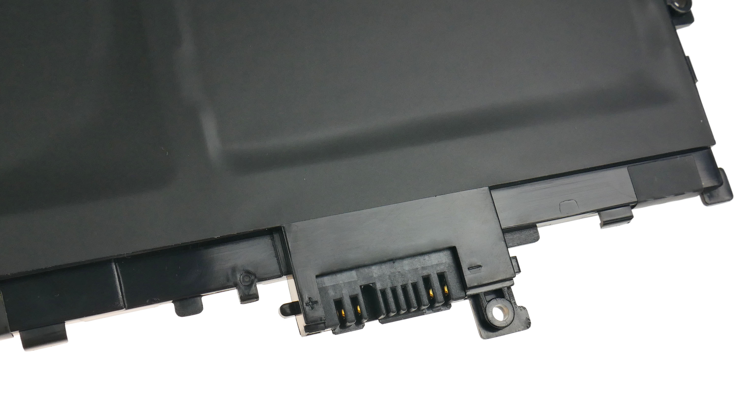 Zbliżenie czarnej baterii laptopa z czarną wtyczką złącza.