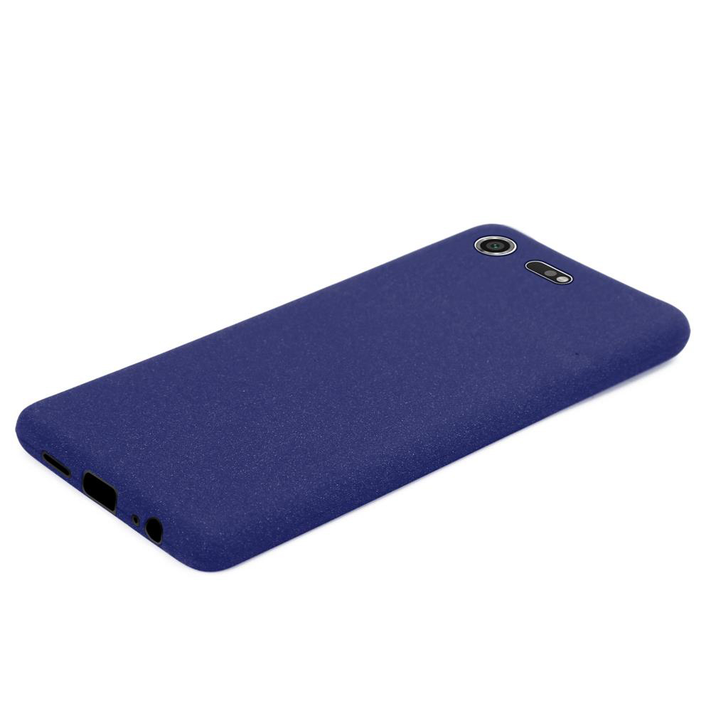 Custodia blu scuro per telefono con foro fotocamera e porte.