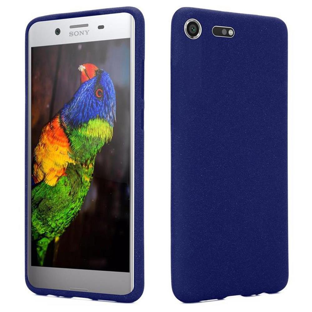Una custodia blu per telefono accanto a uno smartphone Sony con schermo di uccello colorato.