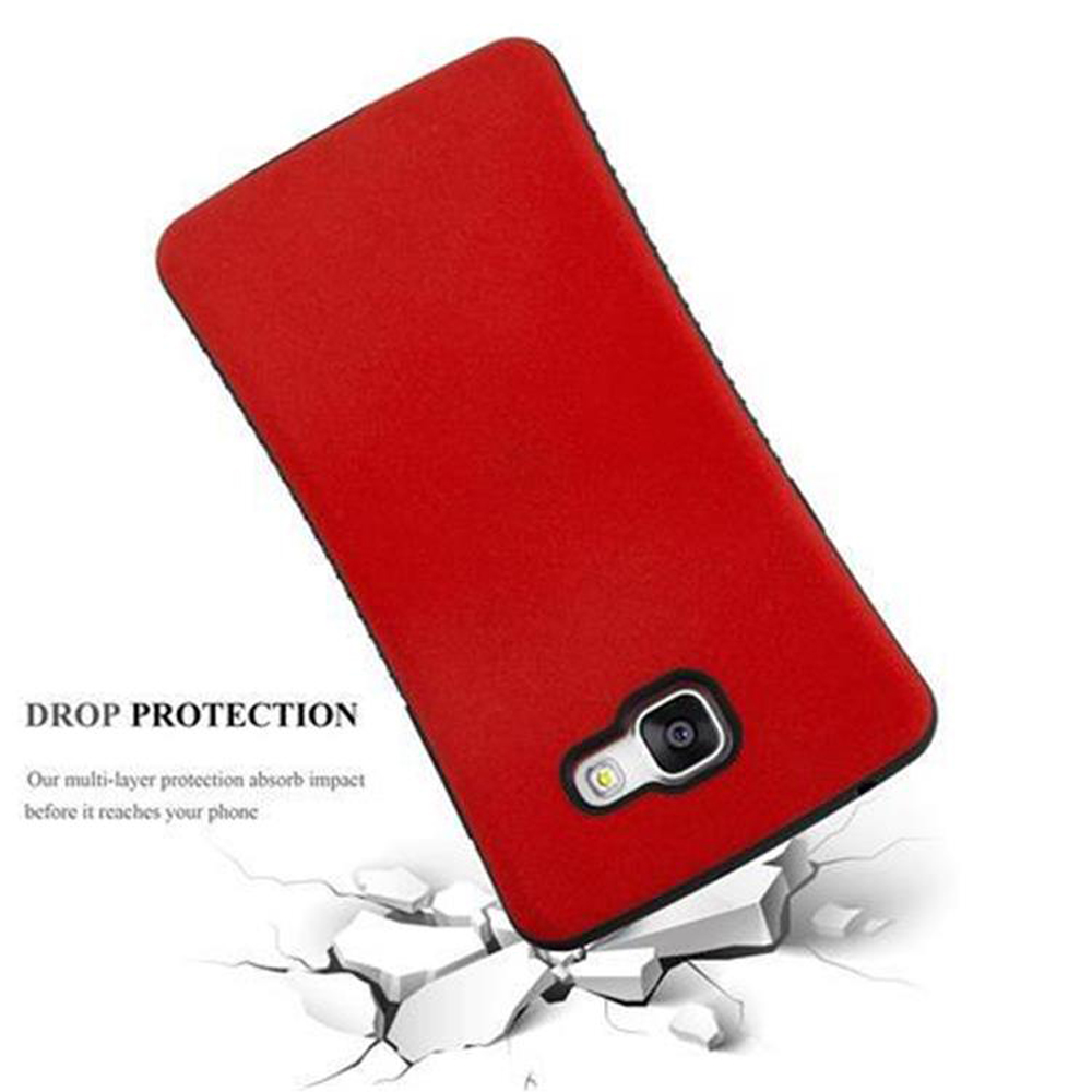 Funda roja para teléfono con protección contra caídas sobre suelo agrietado.