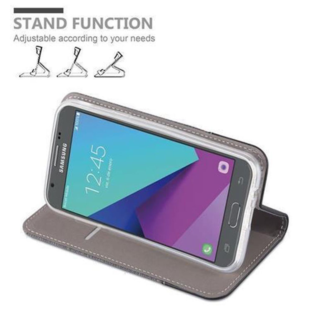 Telefono Samsung in una custodia grigia che funge da supporto.