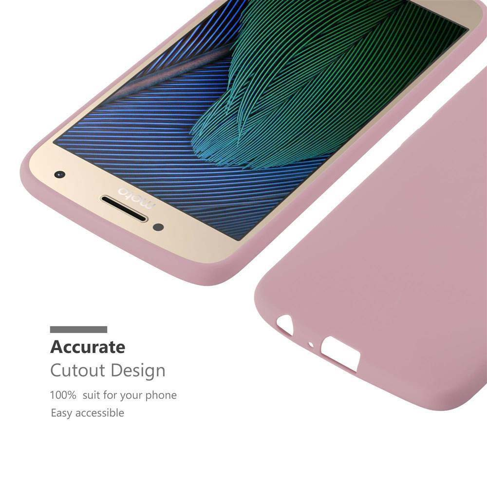 Una cover rosa giace accanto a uno smartphone con schermo a motivo verde.