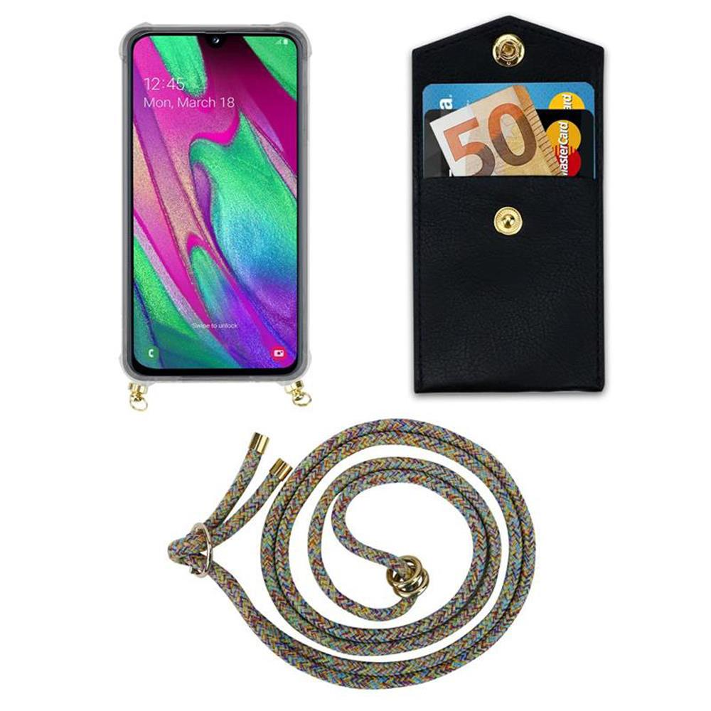 Smartphone con custodia, portafoglio con soldi e carta, corda colorata.