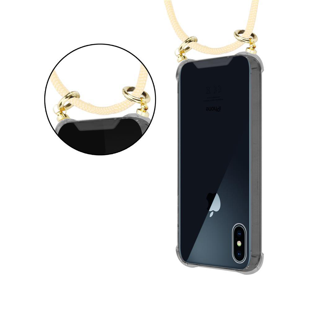 Una custodia trasparente per iPhone con cinturino beige chiaro e hardware dorato.
