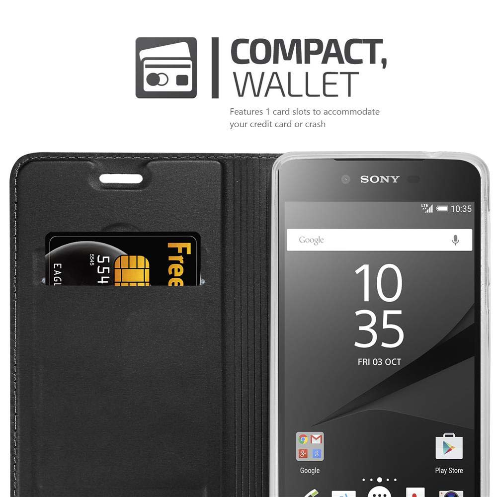 Uno smartphone nero in una custodia a portafoglio con una carta.