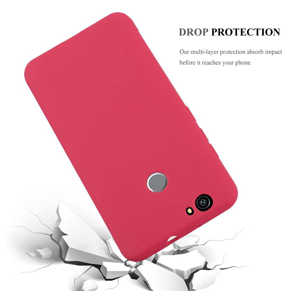 Cover rossa per telefono cade su terreno incrinato, mostrando protezione.