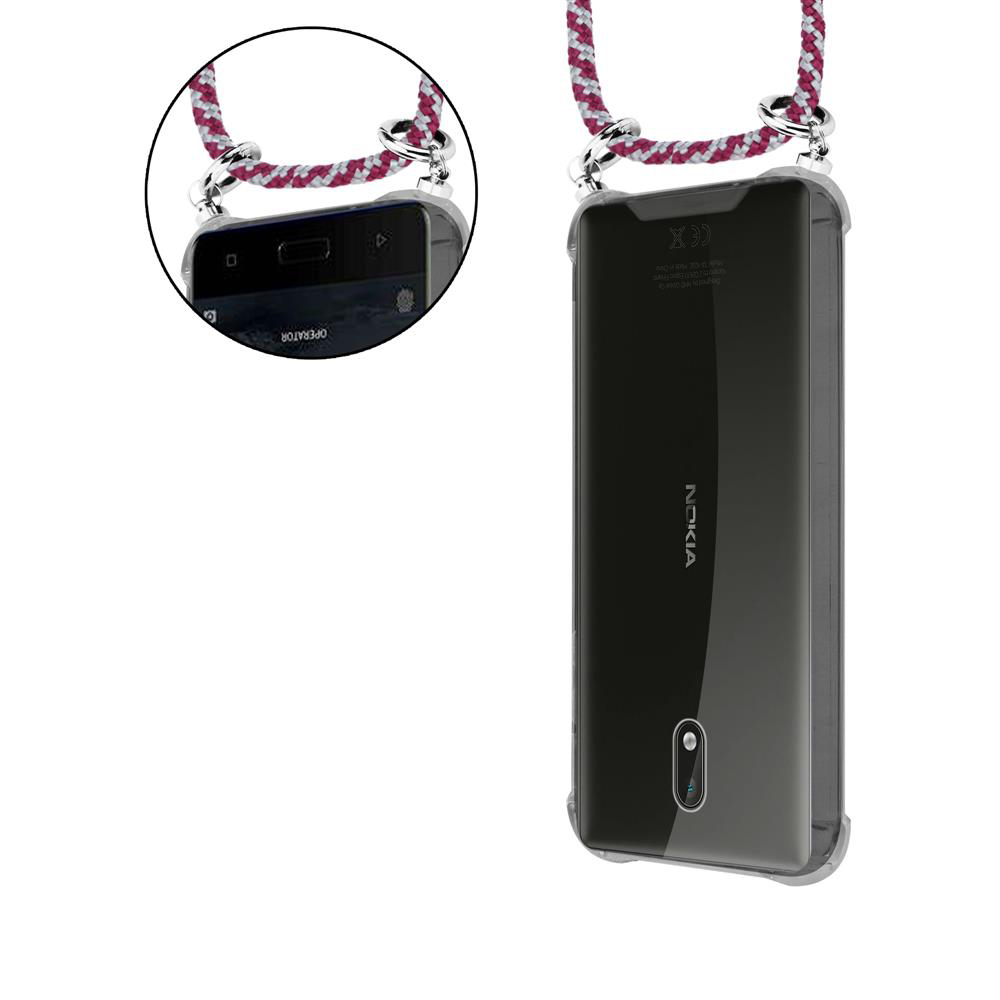 Ein transparentes Nokia-Handy mit einem roten und weißen Band, das daran befestigt ist.