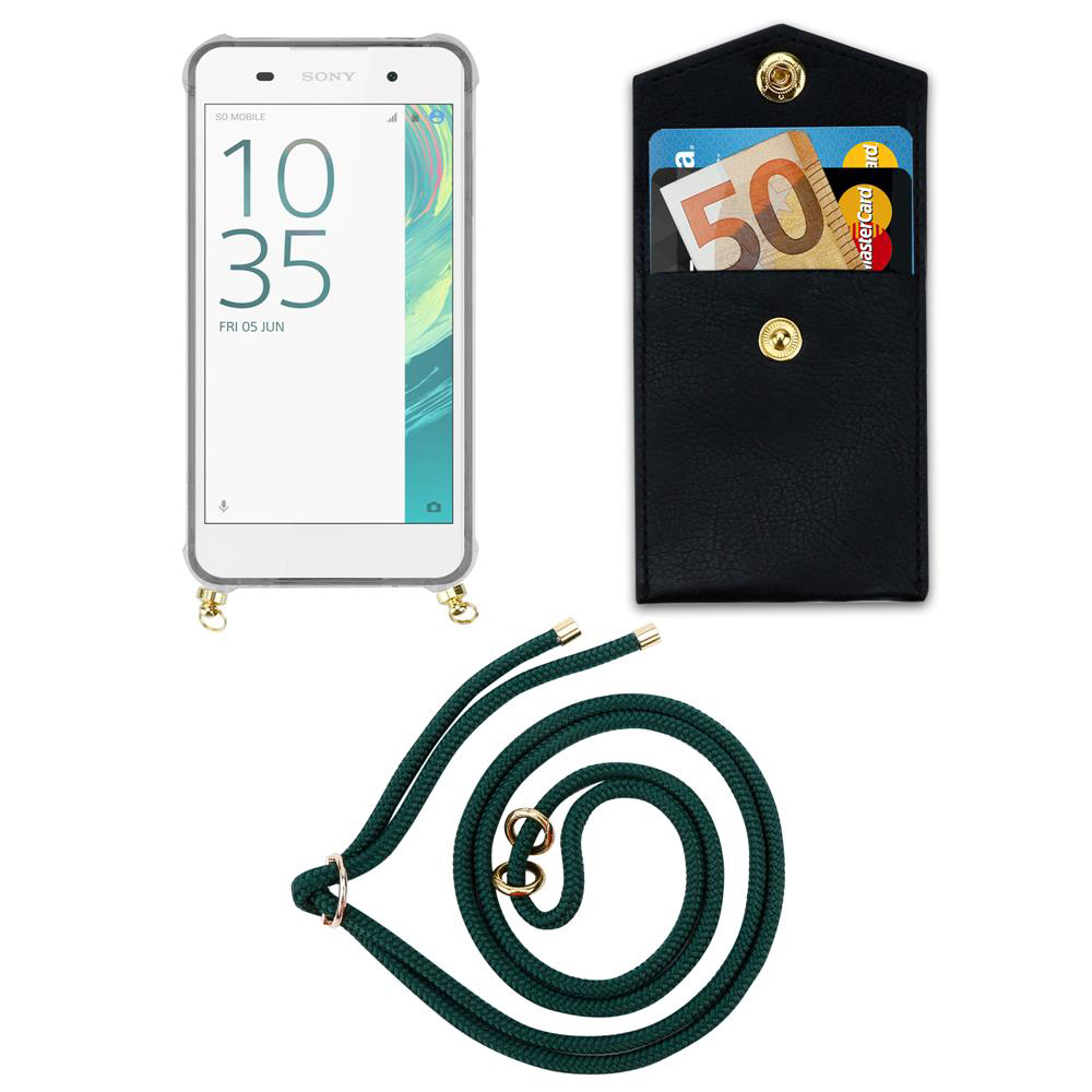 Ein Smartphone mit Hülle, eine schwarze Tasche mit Geld und Karten, und eine grüne Kordel.