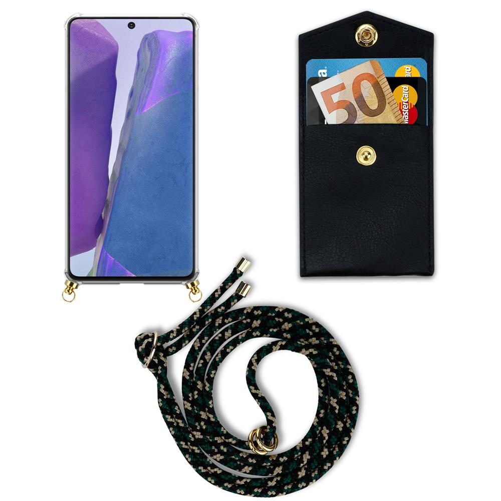 Un portafoglio nero con carte e soldi, uno smartphone e un laccio su sfondo bianco.