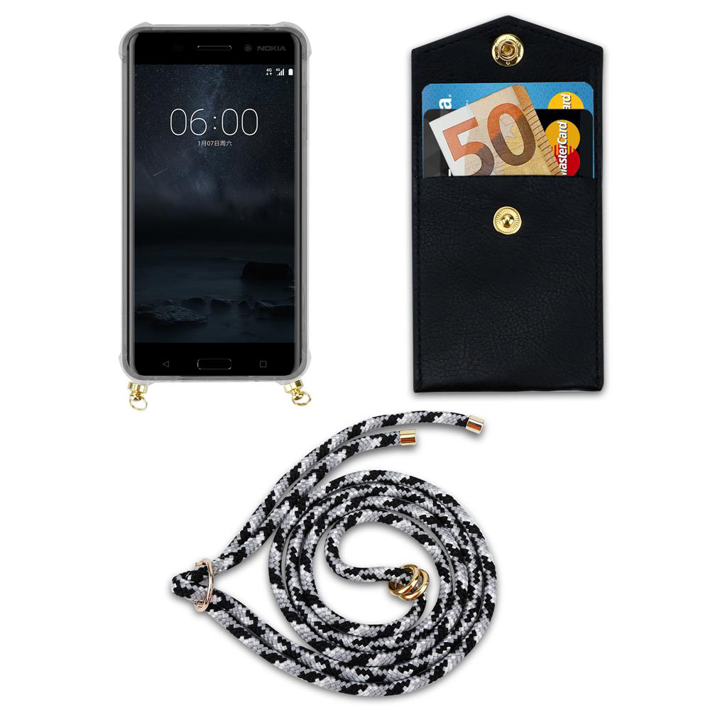 Nokia-Handy mit schwarzer Hülle, Portemonnaie mit Geld und Karten, Kordel.