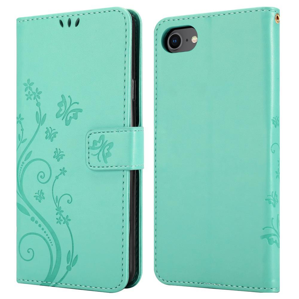 Türkisblaues Flip-Case mit Blumenmuster, innen schwarz, mit Magnetverschluss.