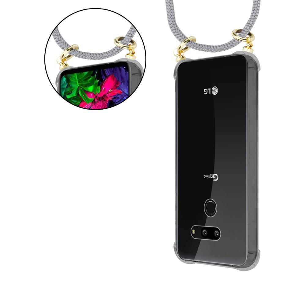 Ein schwarzes LG-Smartphone mit einer Hülle und einem Band.
